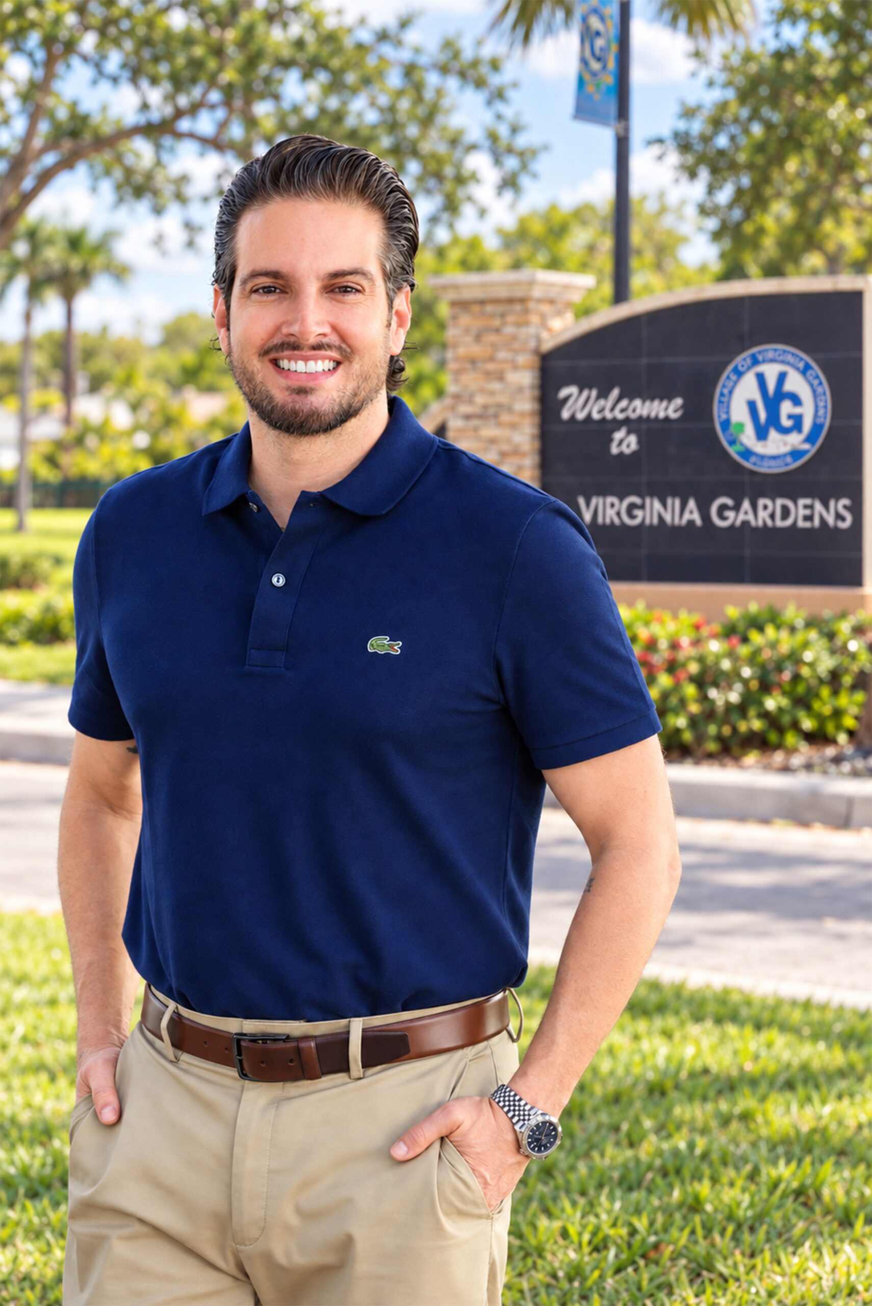 Michael Tur, Virginia Gardens council member, standing in front of the Virginia Gardens welcome sign